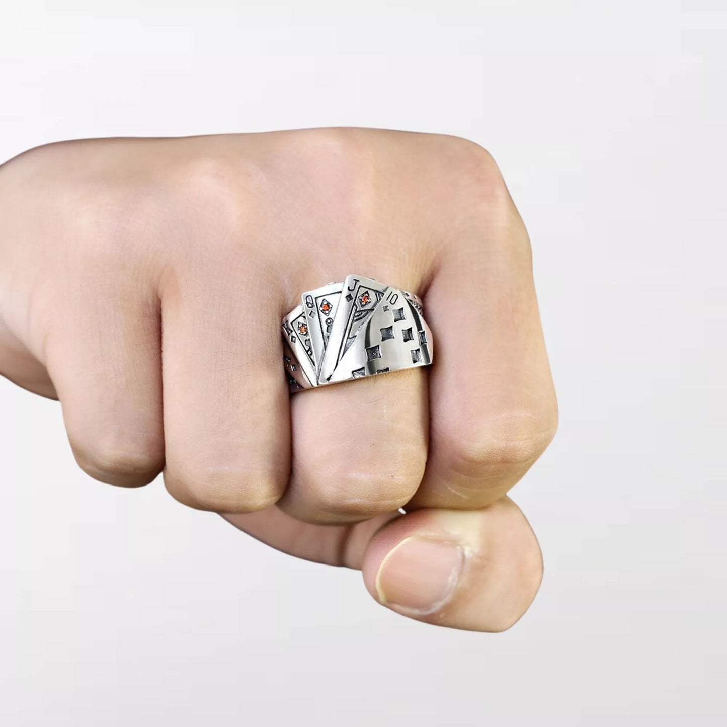 A hand wearing The Poker Sterling Silver Ring By Clotechnow Brand - Clotechnow