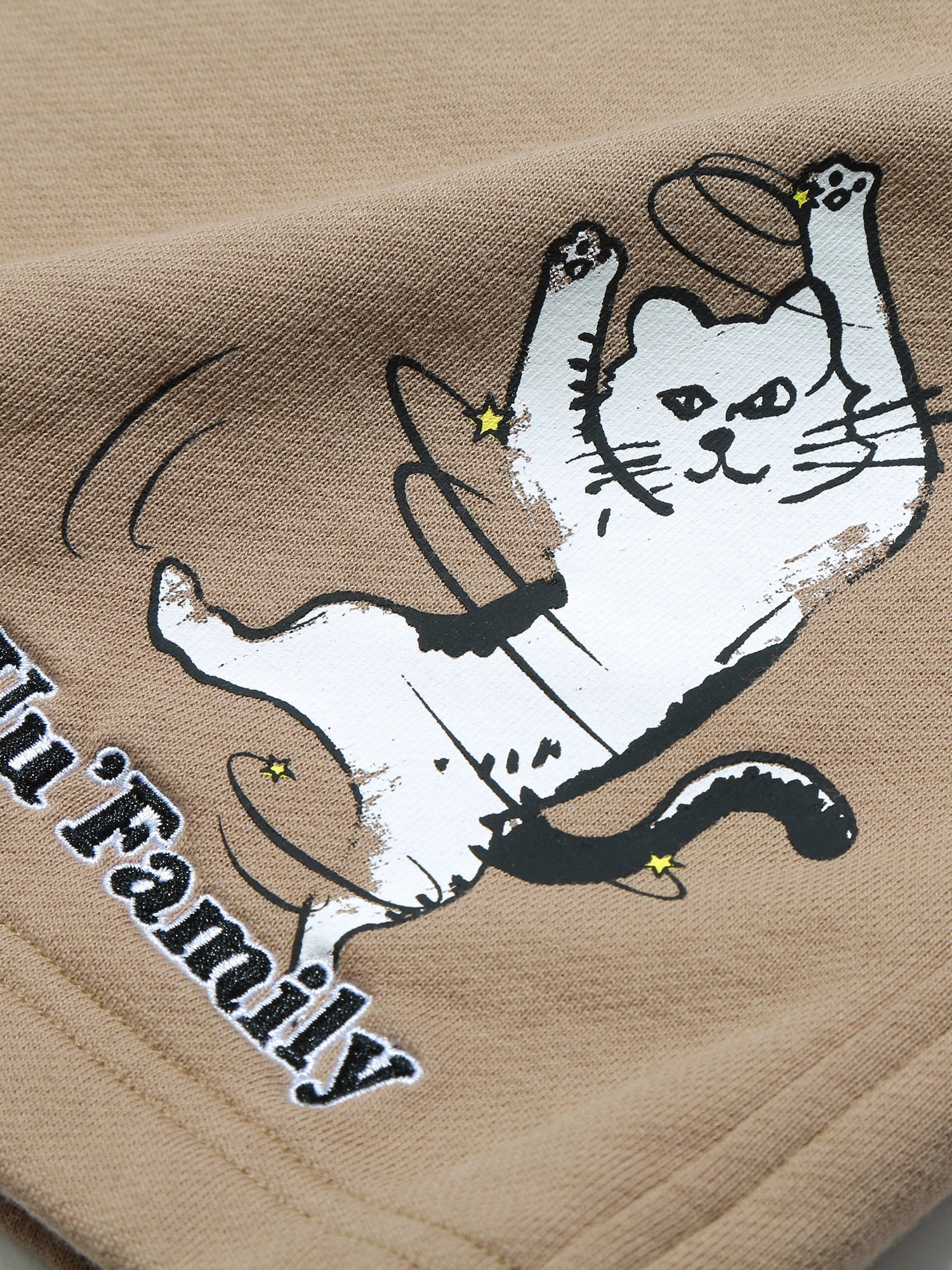 Cat got your tongue? These purrfect khaki shorts with a cat print will definitely turn heads.