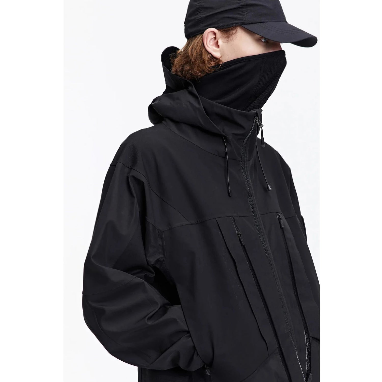 A man wearing The 0107 Ski Down Techwear Jacket in Black Color