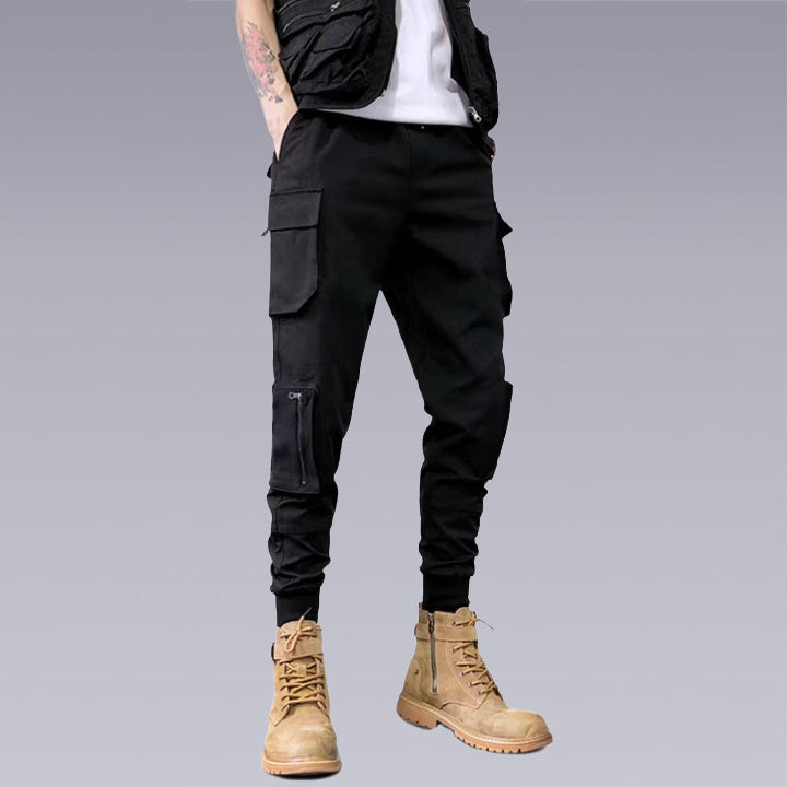 our X-21 Cargo Pants are perfect for rough travel or everyday wear. Made of a durable, flexible fabric for comfort to make your adventures extra memorable. Shown in black with 6 pockets to fit all your necessities plus an intricate design throughout each leg. Can be dressed up or down so you can have one pair of pants that does it all ― keep yourself looking fashionably laidback no matter what adventure awaits you!