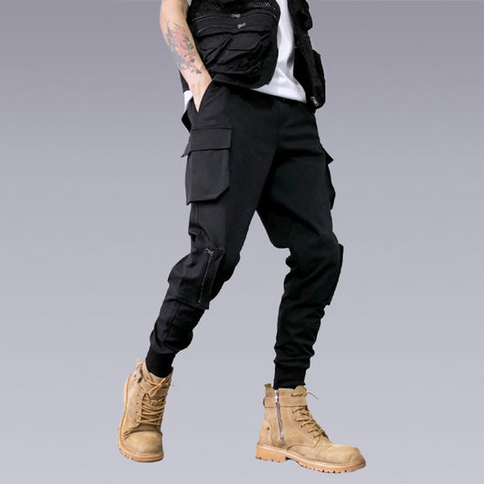 Elvvie -The X-21 Cargo Pants are sturdy and sleek. The slant side pockets create a perfect fit in any setting, whether you are traveling or just lounging leisurely on the beach. With 3D multi-pocket accessories, these pants are made with quality that lasts from dawn to dusk and every moment in between.
