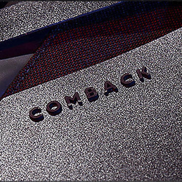 Comback name on the backpack zip up close up image