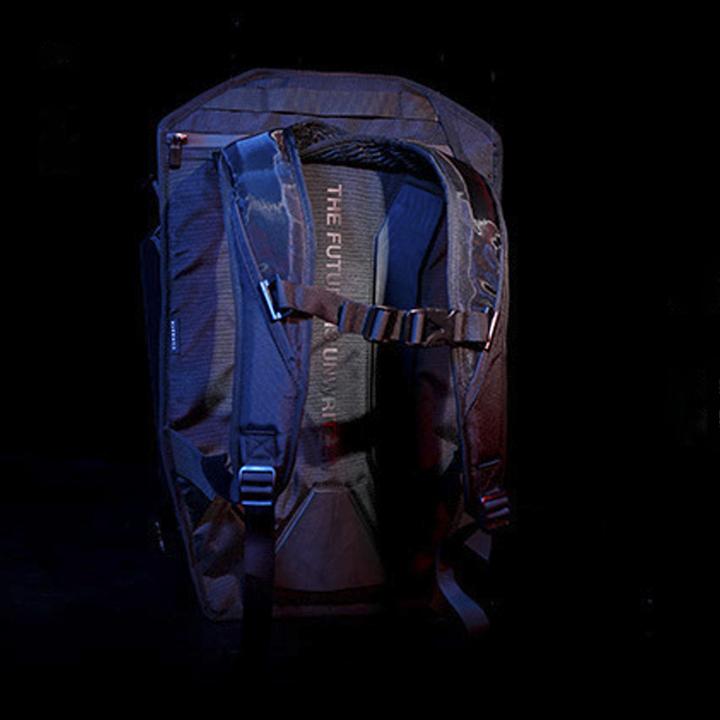 A close up image of the cyberpunk backpack from the back side in a black background