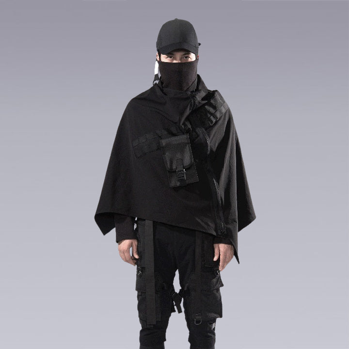 A man wearing the cyberpunk / techwear zip up black cape - Front Side