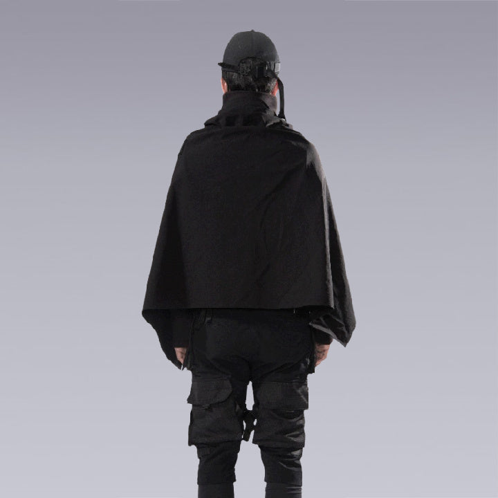 A man wearing the cyberpunk / techwear zip up black cape - Back Side