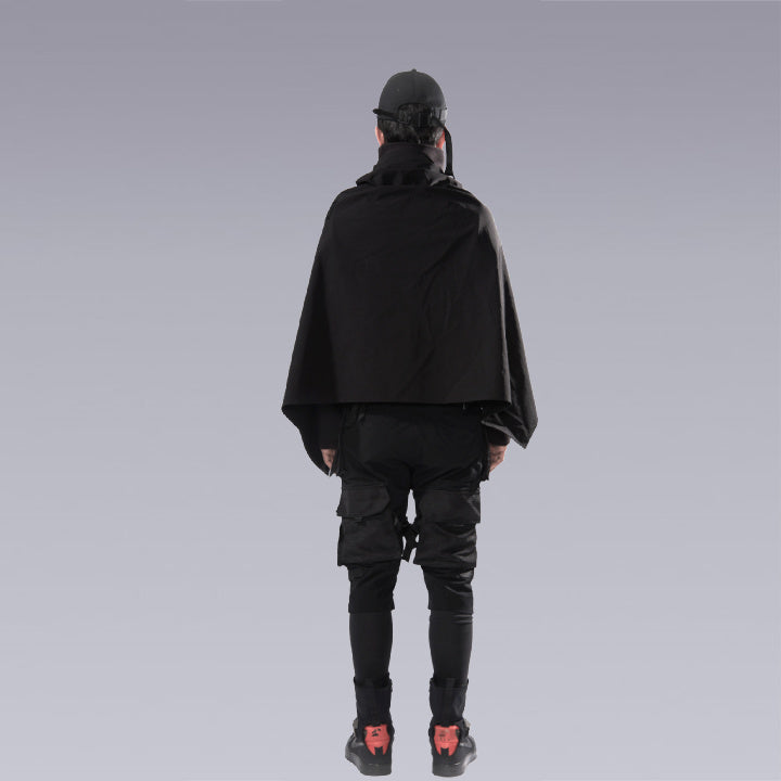 A man wearing the cyberpunk / techwear zip up black cape - Full outfit