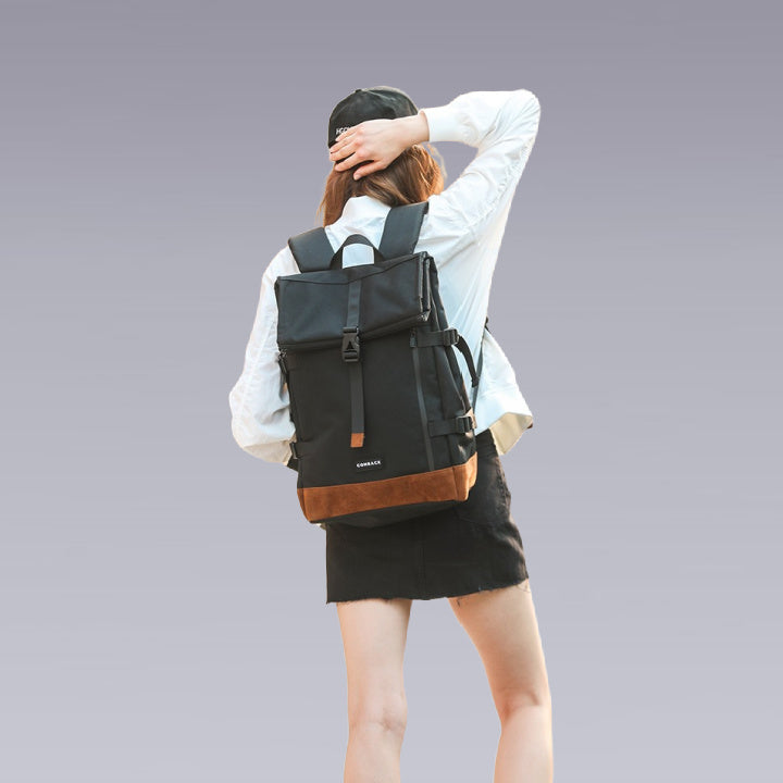 a women wearing the Japanese backpack in black and khaki color