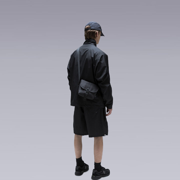 man wearing the unisex waterproof shoulder bag by clotechnow