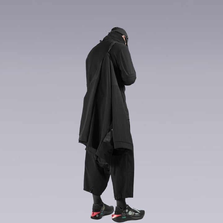 A man look from behind hanging the techwear ninja black kimono on his shoulders 