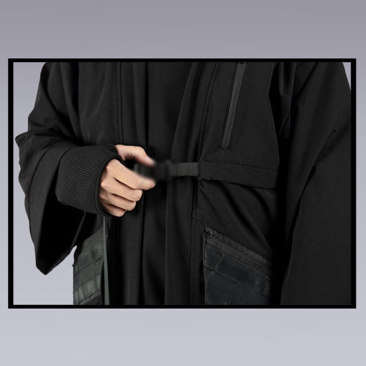 A man fastens the chest belt of the techwear ninja black kimono