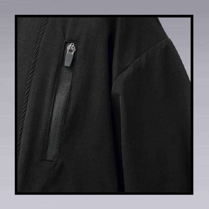 The waterproof zippered pocket of the techwear ninja black kimono, image close up.